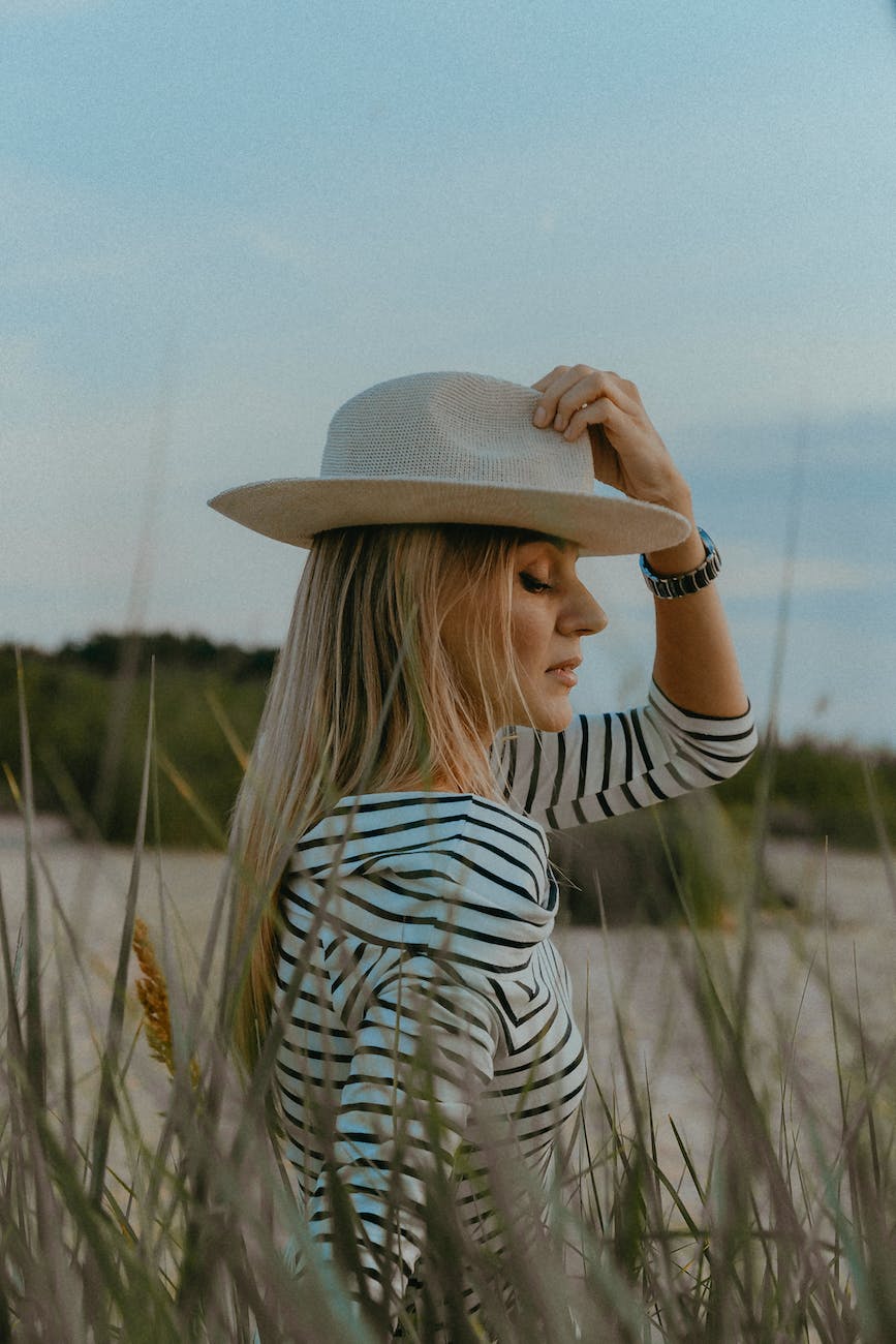 woman in a striped dress and hat